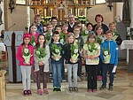 Logo Buchsübergabe an Kommunionkinder