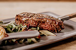 Logo Wir heizen den Holzkohlegrill an